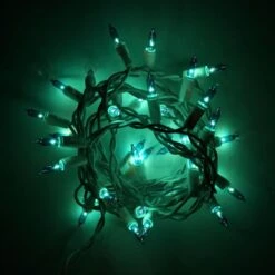 100-bulb Teal Mini Lights, 4" Spacing, Green Wire -Christmas Light Store 35 teal glass craft lights white wire c 75aca118 8b25 4a55 8b0f 9ccbe57e9e9b