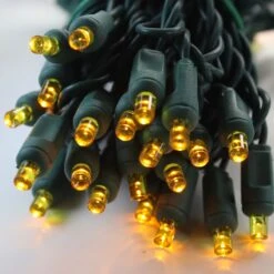 50-light 5mm Yellow LED Christmas Lights, 4" Spacing Green Wire