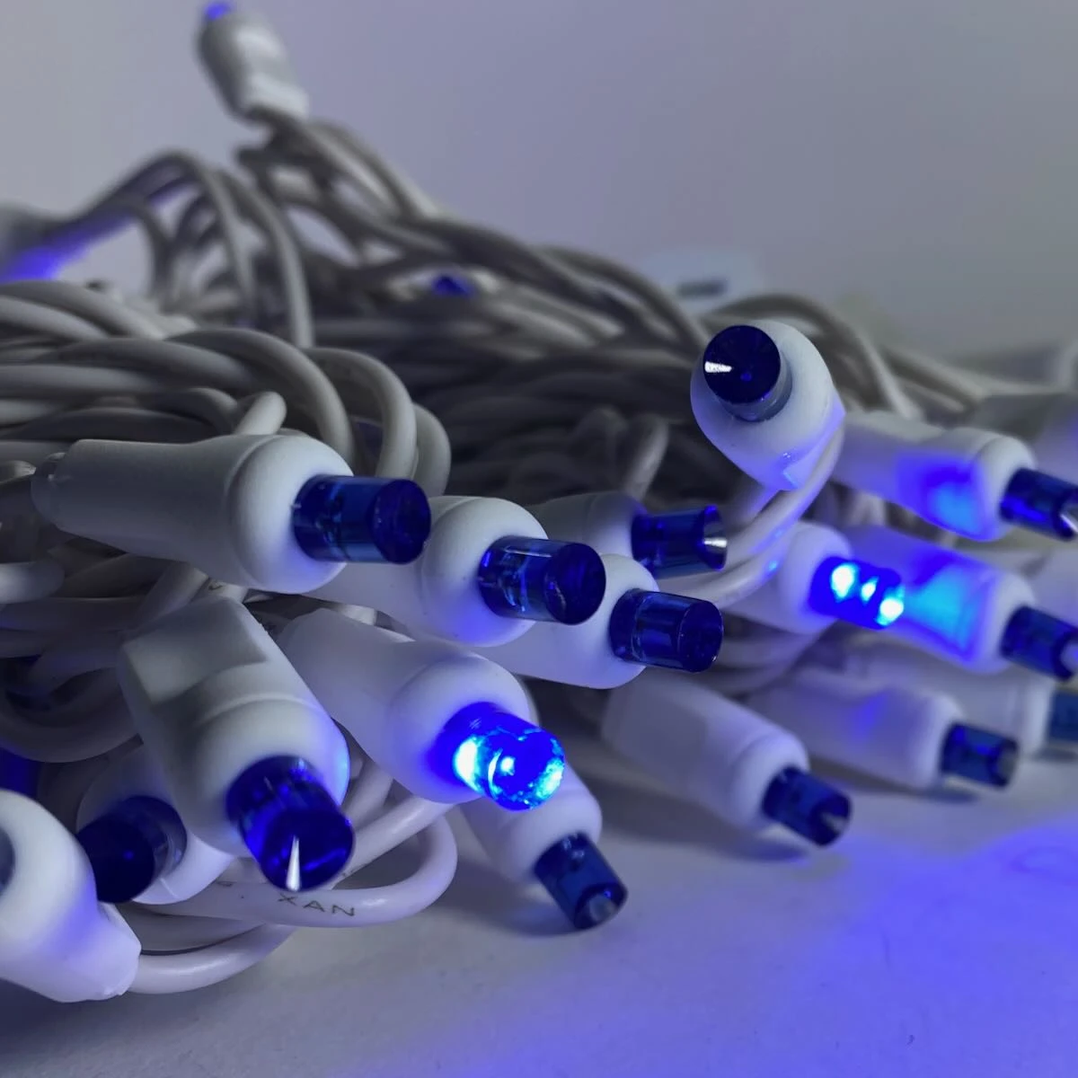 50-light 5mm Blue Strobe LED Christmas Lights, White Wire 4" Spacing 1 50-light 5mm Blue Strobe LED Christmas Lights, White Wire 4" Spacing