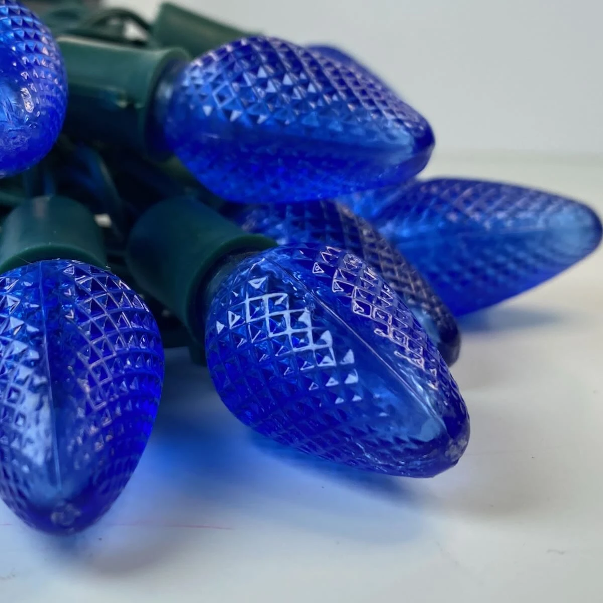 25-light C7 Blue LED Christmas Lights, 8" Spacing Green Wire 4 25-light C7 Blue LED Christmas Lights, 8" Spacing Green Wire - Image 4
