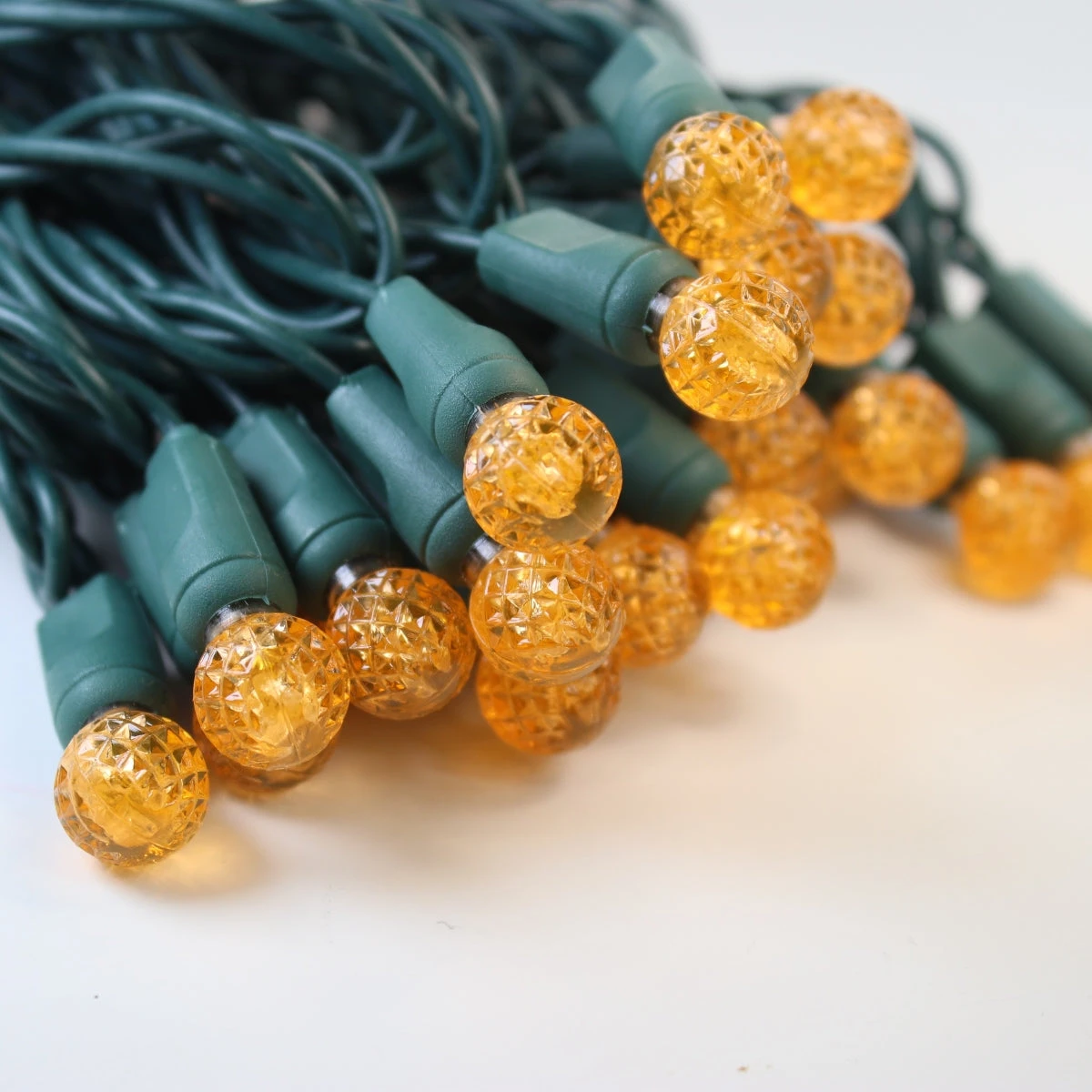 50-light G12 Orange LED Christmas Lights, 4" Spacing Green Wire 2 50-light G12 Orange LED Christmas Lights, 4" Spacing Green Wire - Image 2