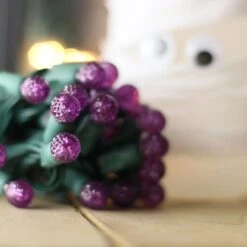 50-light G12 Purple LED Christmas Lights, 4" Spacing Green Wire -Christmas Light Store g12 purple led christmas light 82818