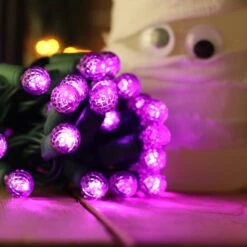 50-light G12 Purple LED Christmas Lights, 4" Spacing Green Wire -Christmas Light Store g12 purple led halloween light 82818