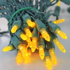 50-light M5 Yellow LED Christmas Lights, 4" Spacing Green Wire -Christmas Light Store m5 yellow b led christmas lights green wire a989db2e 652b 40c5 a6ca 330e021547c8
