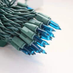 100-bulb Teal Mini Lights, 6" Spacing, Green Wire -Christmas Light Store teal mini lights green wire a 52b6c8e5 a579 4395 bef3 f881290a95f7