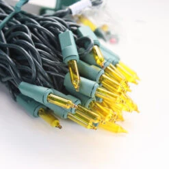 100-bulb Yellow MiniLights, 4" Spacing, Green Wire -Christmas Light Store yellow mini lights green wire a